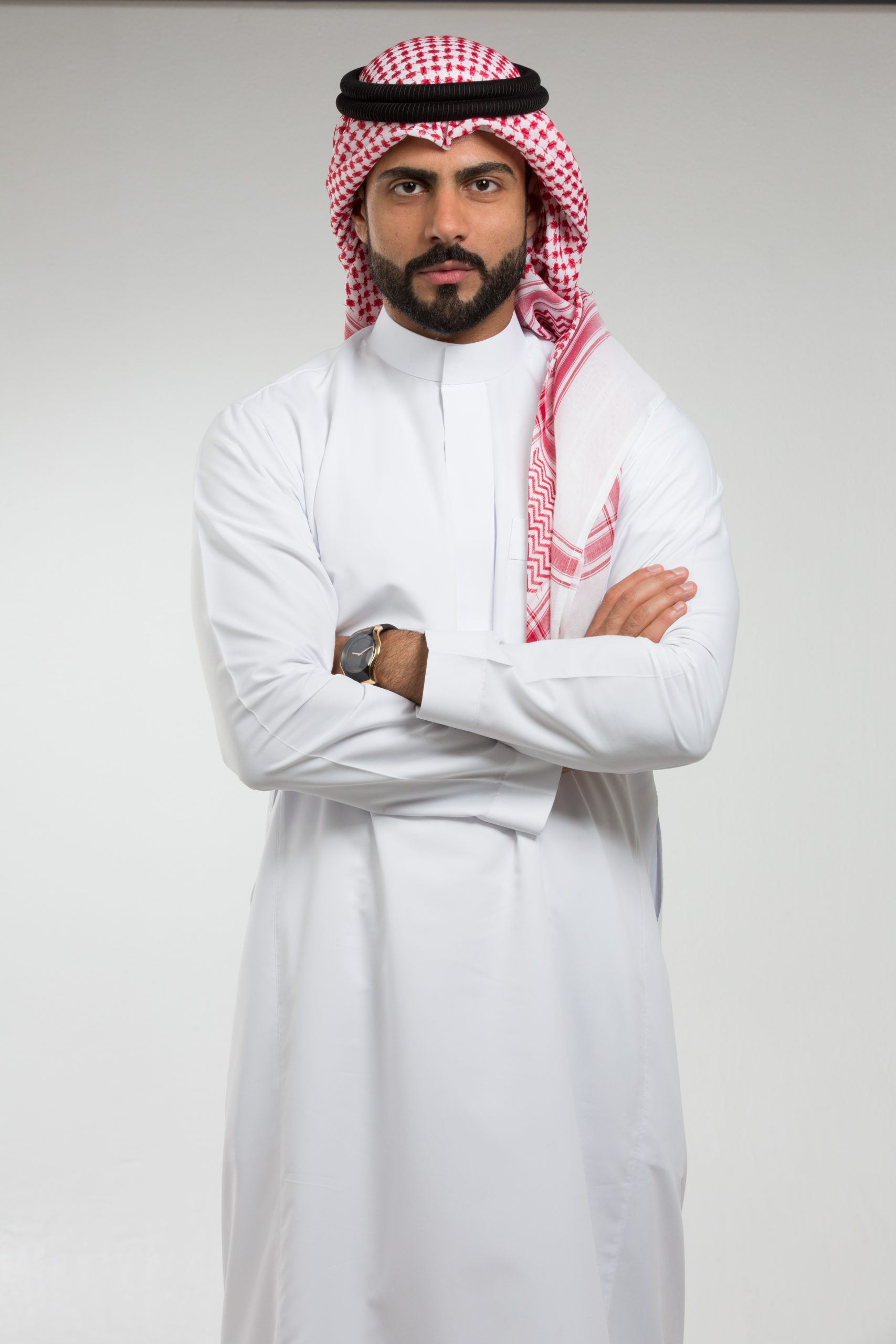 Arab man wearing dishdasha and thobe.