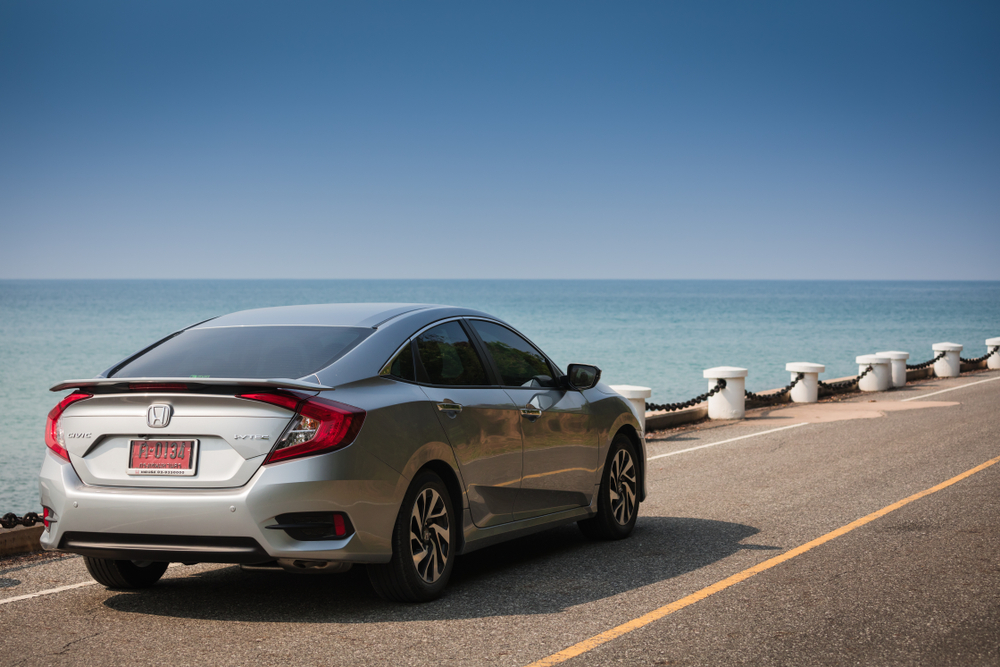 Honda civic car by the shore. 