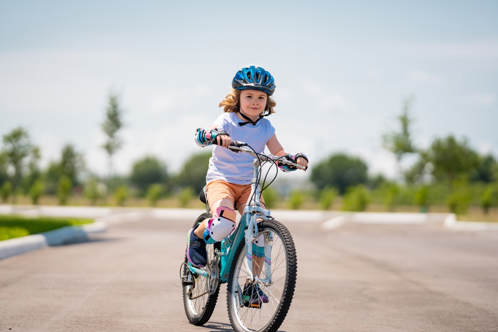 a child riding a bike.