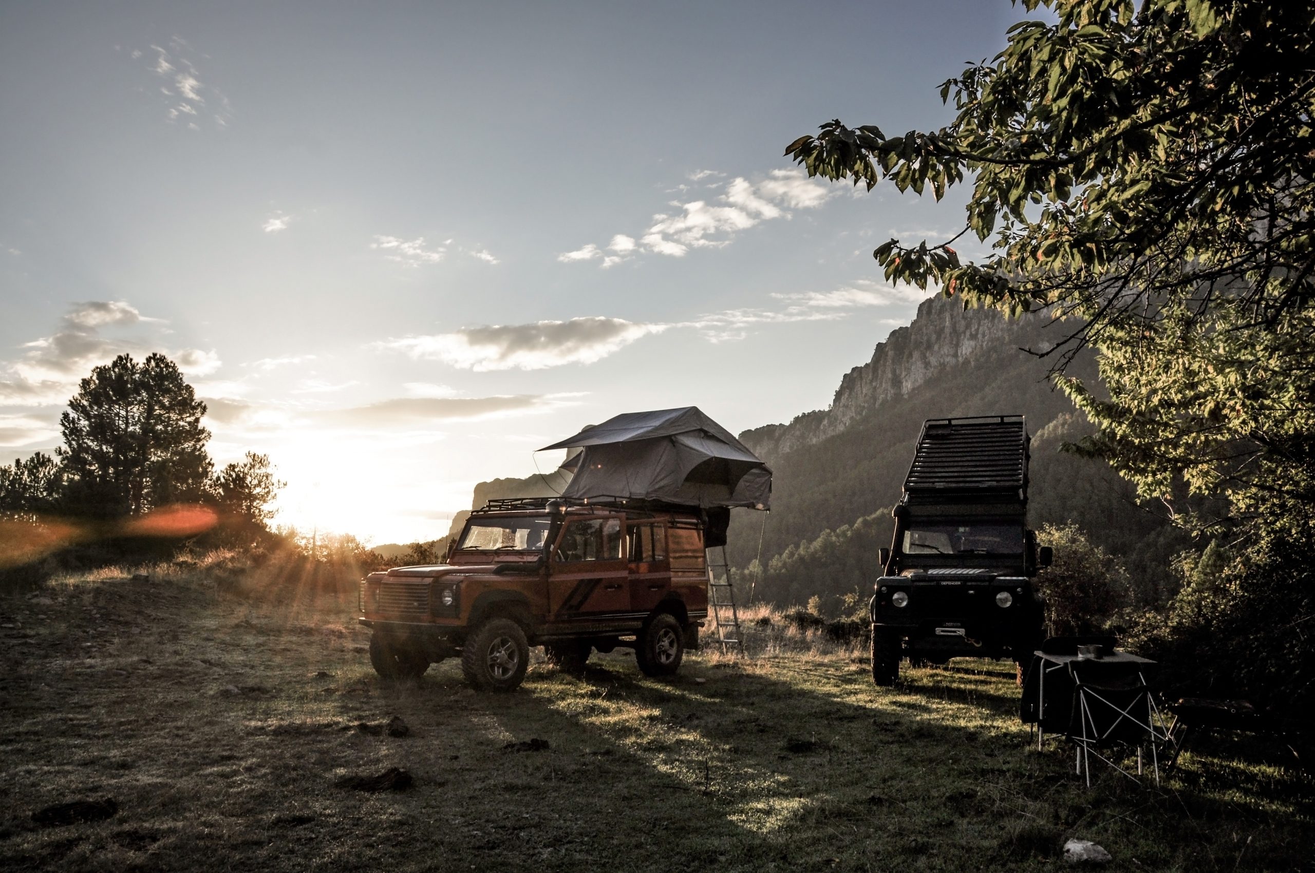 a camping car with a roof tent. 