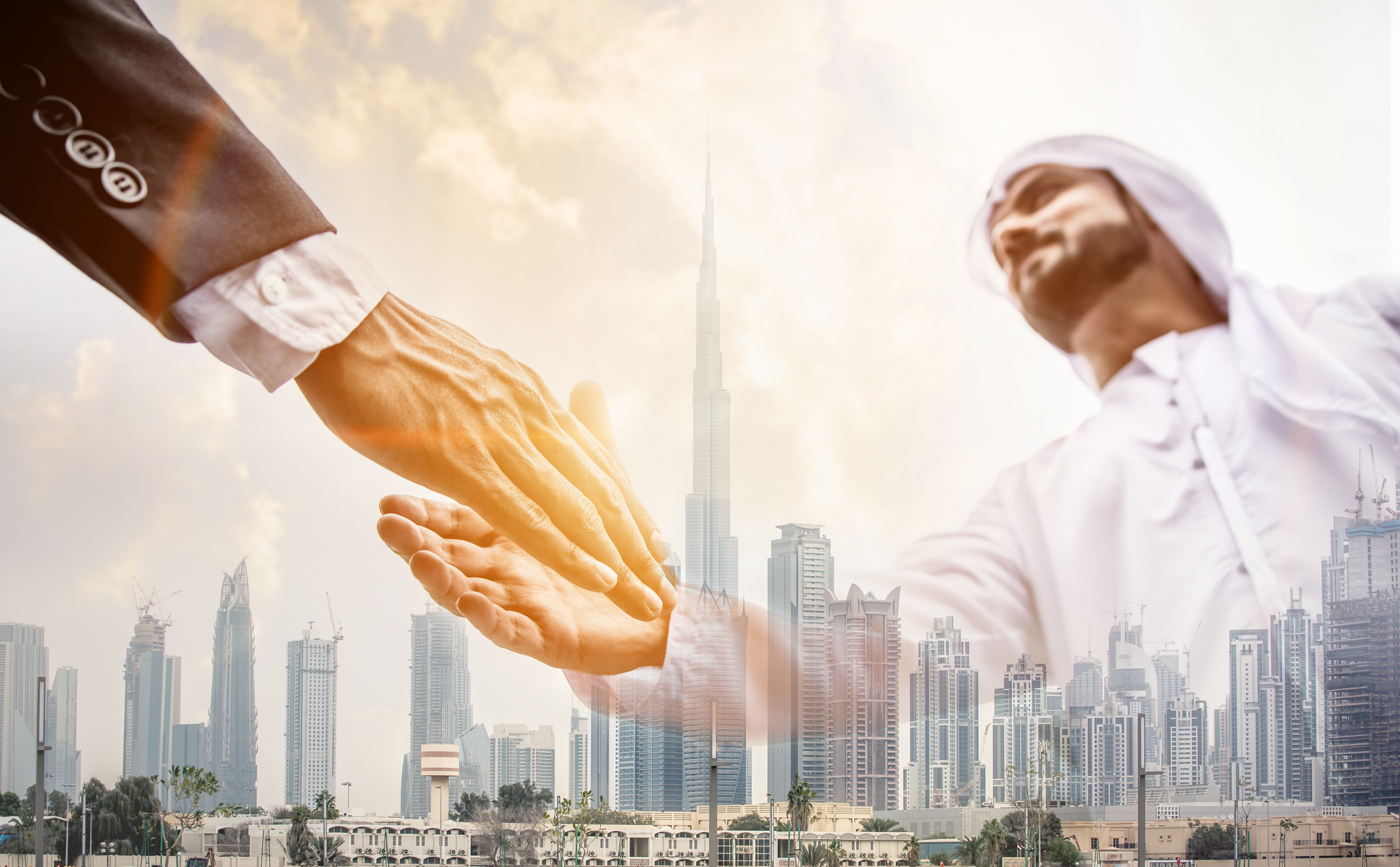 2 businessmen shaking hands regarding a property investment opportunity