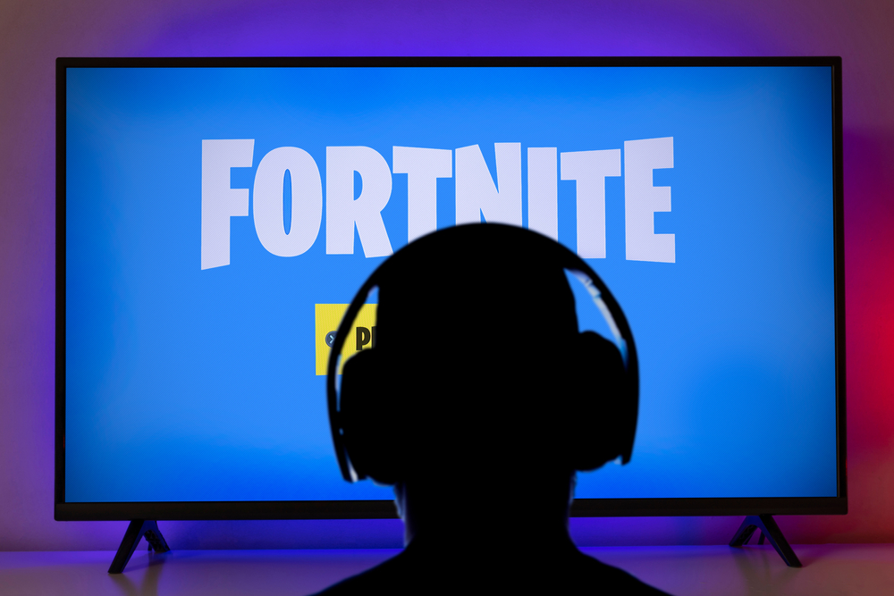 man playing fortnite game.