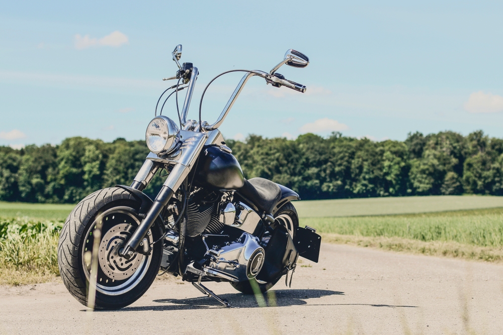 Black Harley Davidson parked on the road